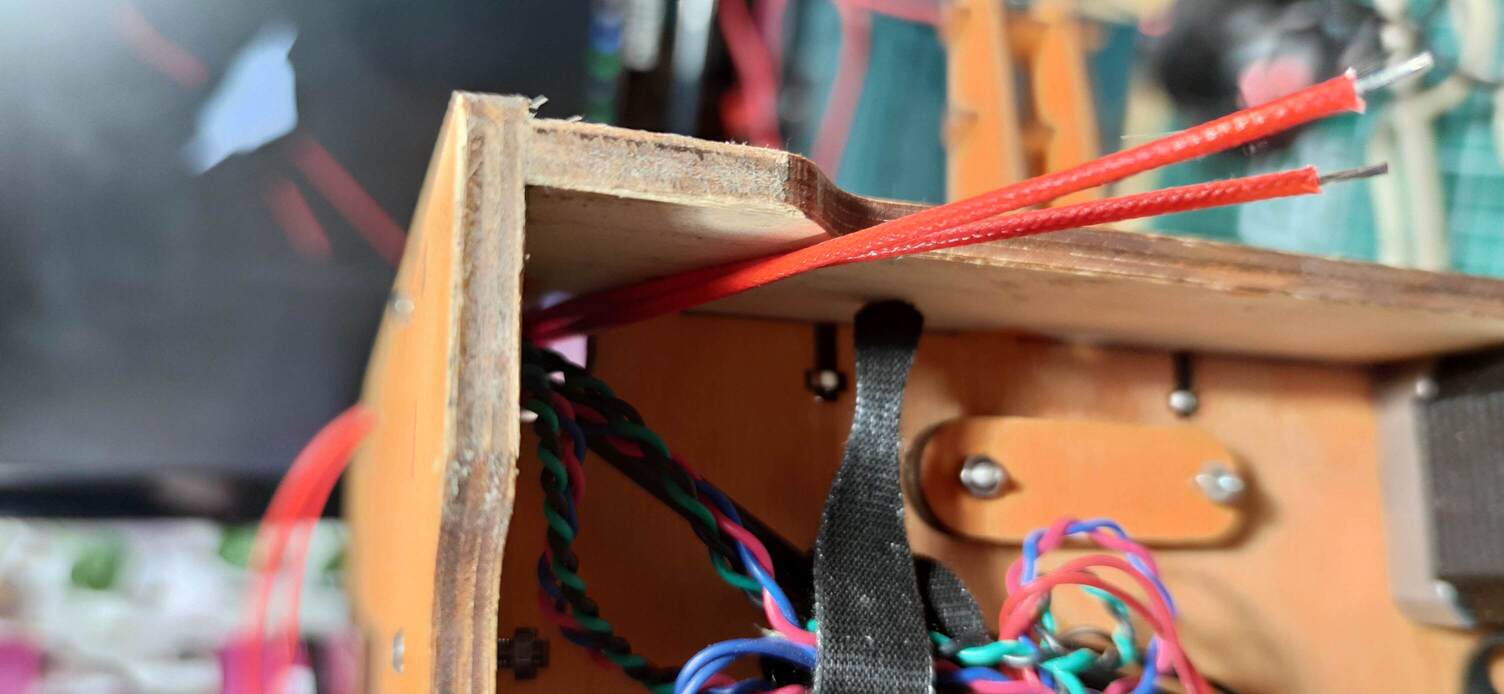 The harness under the machine